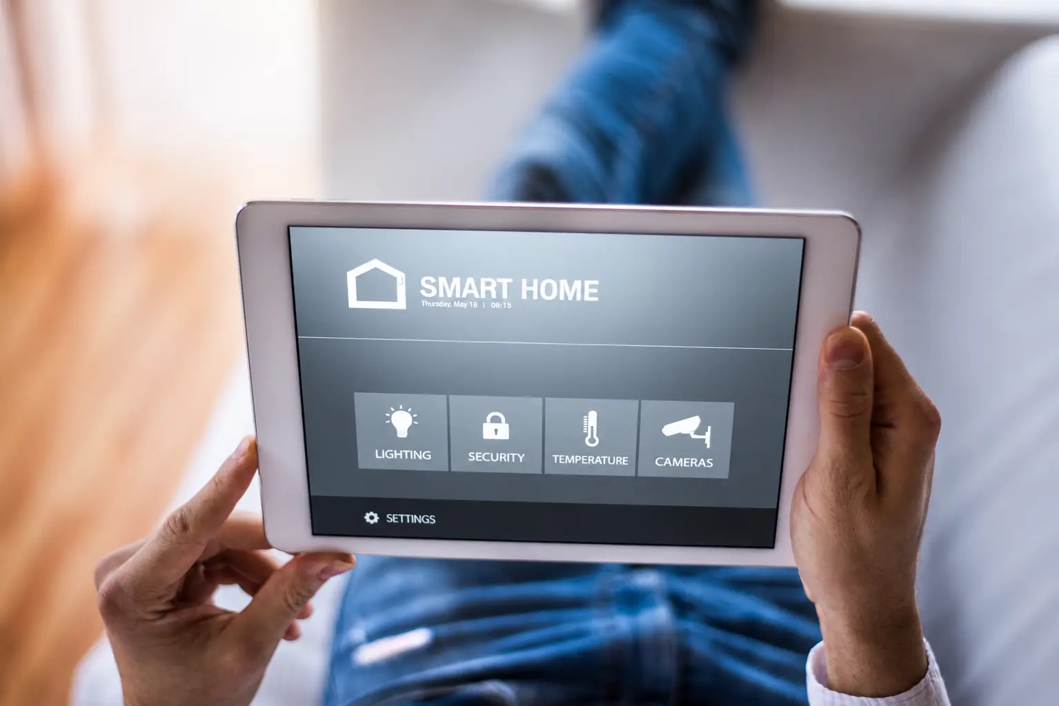 Tablet running a smart home control dashboard