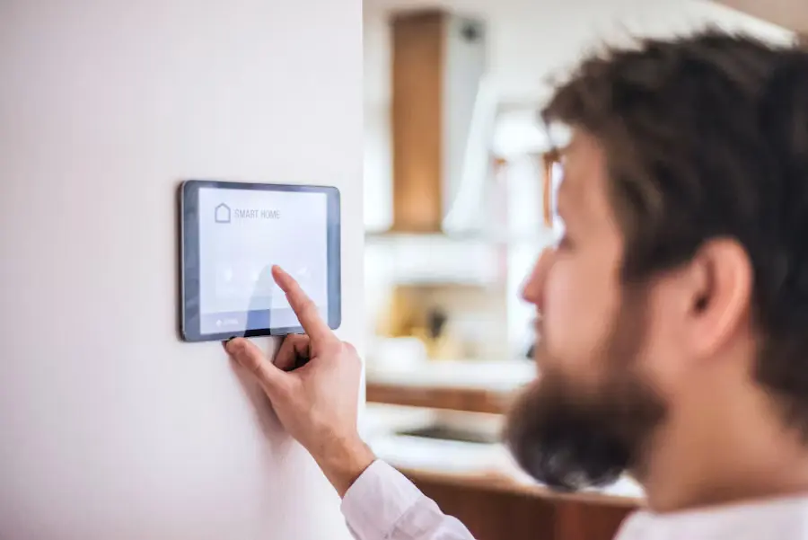 A tablet running a smart home automation hub interface