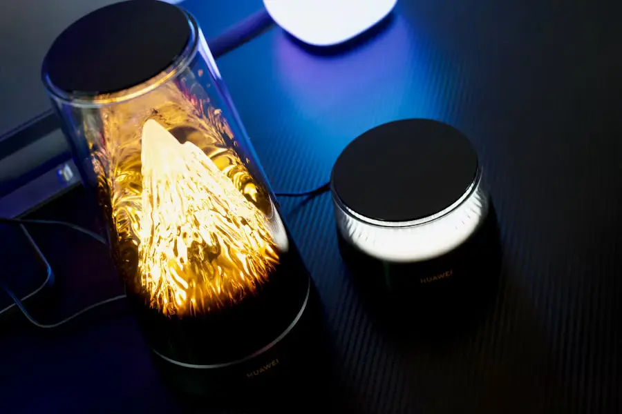 A glowing smart lamp beside a smaller decorative light