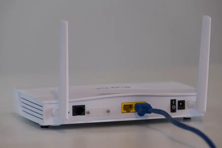 A white Wi-Fi 6 router on a table